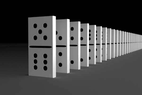 Imagen-de-fichas-de-domino-en-serie-para-evidenciar-una-serie-logica